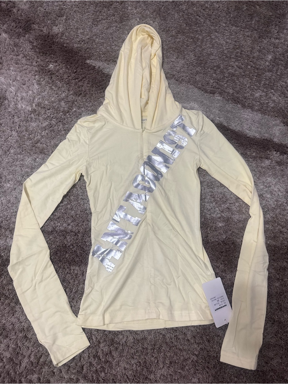 Antagonist butter yellow sweater